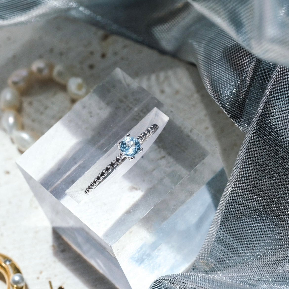 Airy Poison | Sky Blue Topaz ring- Platinum- Buy one Get one pearl ring FREE