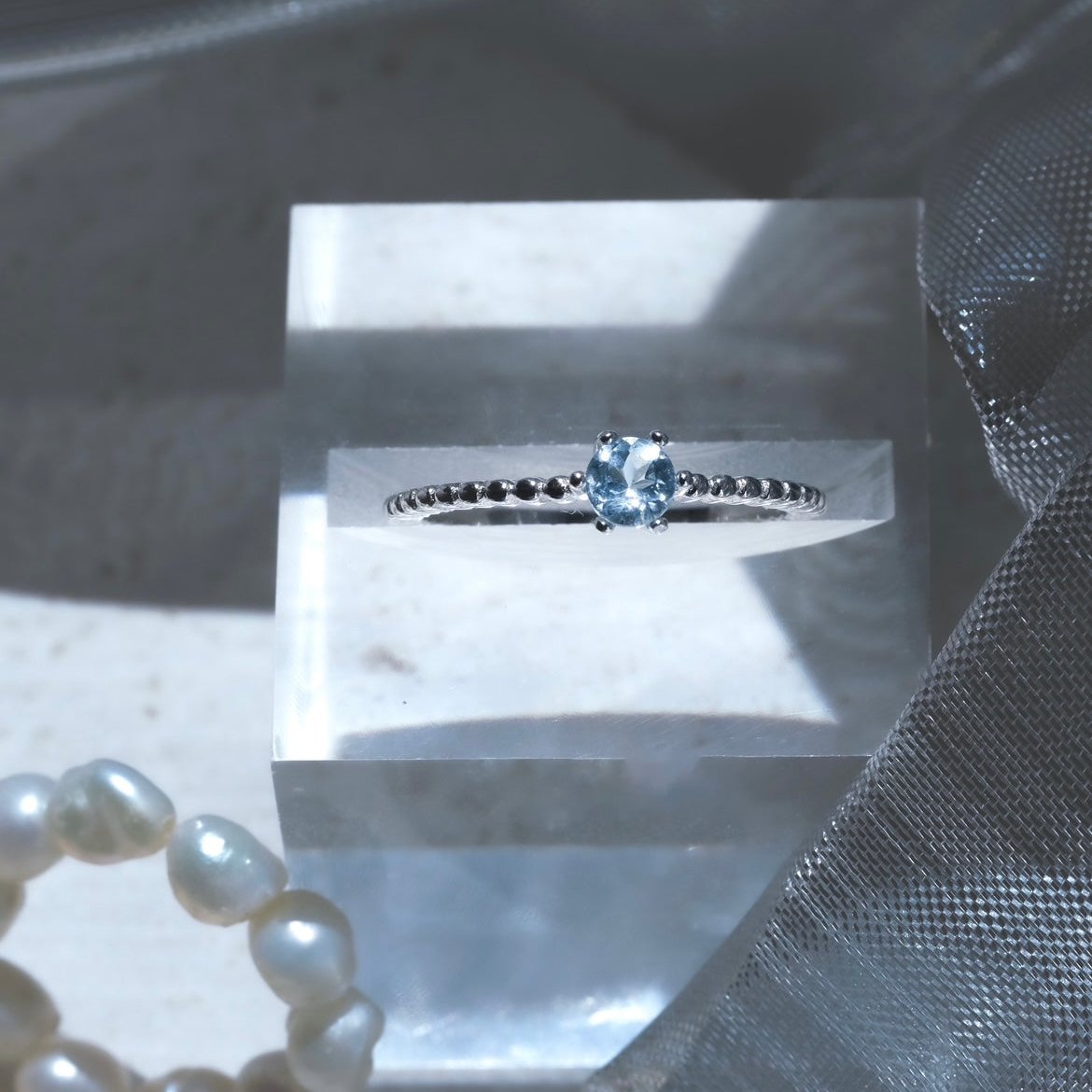 Airy Poison | Sky Blue Topaz ring- Platinum- Buy one Get one pearl ring FREE